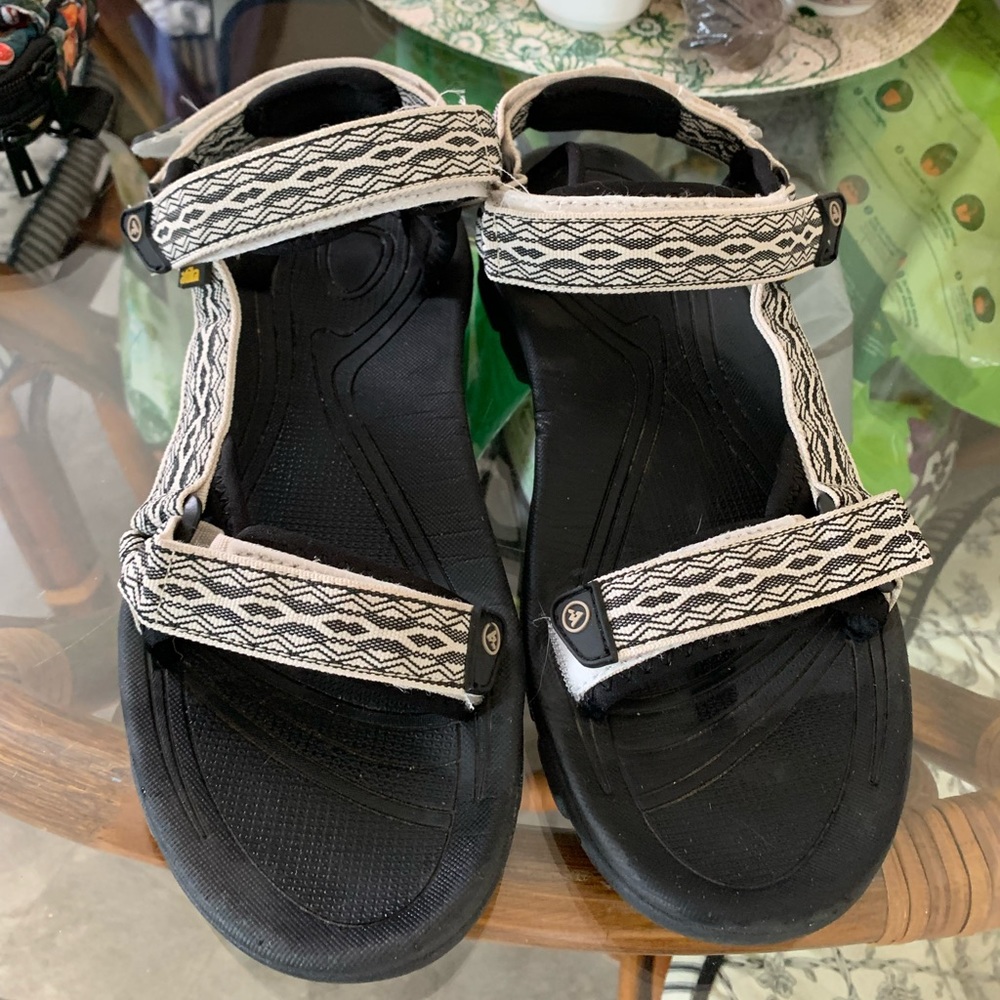 Size 10 Atika sandals, worn a few times, black sole with black and white straps